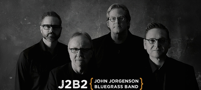 Black-and-white promotional image of four musicians for J2B2, the John Jorgenson Bluegrass Band.