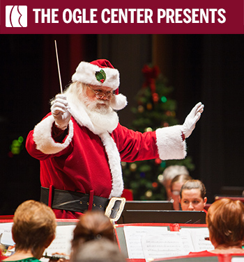 Photo of Santa Claus conducting an orchestra