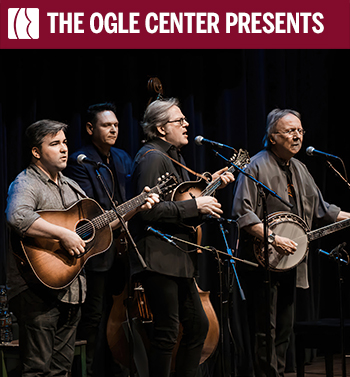 John Jorgenson Bluegrass Band performing onstage with guitar, mandolin, upright bass, and banjo.